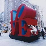 The Bruce High Quality Foundation, Public Sculpture Tackle (Love), 2007, C-print