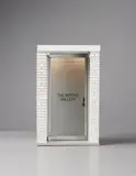 Maurizio Cattelan, The 1:6 Scale Wrong Gallery, 2006, Wood, brass, steel, aluminum, resin, plastic, glass and electric lighting, with accompanying copy of the Wrong Gallery Times , and four Adam McEwan static cling miniature window signs,