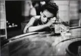 Eve Arnold, Bar Girl in a Brothel in the Red Light District, Havana, Cuba