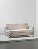 Unique 'Ruban' sofa, commissioned for a private apartment, France by Jean Royere, circa 1950, Painted wrought iron, brass, fabric, offered Apr 2013