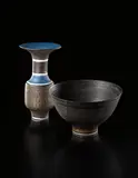 Lucie Rie, Vase, circa 1972, Porcelain, golden glaze with terracotta and inlaid blue rim and shoulder with sgraffito design
