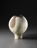 Hans Coper, Early globular pot on foot, circa 1954, Stoneware, layered white porcelain slips and manganese with textured designs
