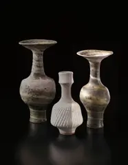 Vase with flaring neck by Lucie Rie, circa 1970, Mixed clays thrown together producing an integral pink/brown and cream spiral in the glaze, sold Apr 2013
