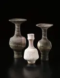 Lucie Rie, Vase, circa 1984, Stoneware, white and pink pitted glaze over a diagonally ‘fluted’ body