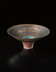 Conical bowl by Lucie Rie, circa 1979, Porcelain, golden manganese glaze with turquoise ring and terracotta well, sold Apr 2013