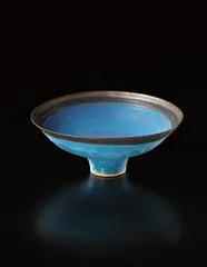 Footed bowl by Lucie Rie, circa 1987, Stoneware, vivid blue and manganese glazes, sold Apr 2013