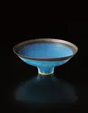 Footed bowl by Lucie Rie, circa 1987, Stoneware, vivid blue and manganese glazes, sold Apr 2013