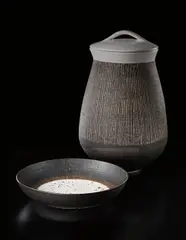 Large open bowl by Lucie Rie, circa 1960, Stoneware, speckled white and manganese glazes, sgraffito lip, sold Apr 2013