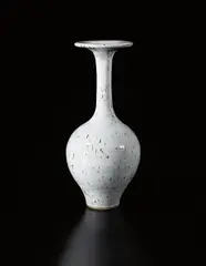Tall vase with flaring lip by Lucie Rie, circa 1958, Stoneware, white glaze with manganese speckle, sold Apr 2013