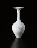 Lucie Rie, Tall vase with flaring lip, circa 1958, Stoneware, white glaze with manganese speckle