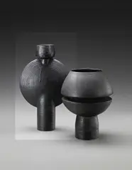 Hans Coper, Composite vase form with central disc, circa 1967, Stoneware, black glaze over a textured body with incised spiralling linear designs