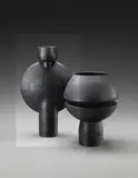 Hans Coper, Composite vase form with central disc, circa 1967, Stoneware, black glaze over a textured body with incised spiralling linear designs