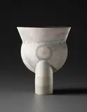 Large 'Thistle' form by Hans Coper, circa 1972, Stoneware, layered white porcelain slips and engobes over a body with textured and incised linear designs, the interior , sold Apr 2013