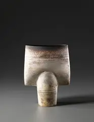 Hans Coper, Large spade form, circa 1978, Stoneware, layered white porcelain slips and engobes over a body with textured designs, the neck and lip with a manganese glaze