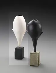 Hans Coper, 'Cycladic' winged bud form, circa 1976, Stoneware, layers of vitreous porcelain slip over a textured body painted with iron and manganese, the interior with a rich manganese glaze, black cuboid base