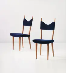 Pair of 'Baltique' dining chairs by Jean Royere, circa 1950, Oak, velvet, sold Sep 2013