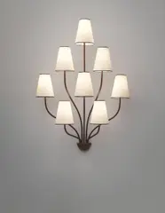 Jean Royere, ‘Persane’ eight-armed wall light, circa 1953, Painted and gilded metal, paper shades