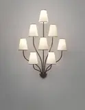 ‘Persane’ eight-armed wall light by Jean Royere, circa 1953, Painted and gilded metal, paper shades, sold Sep 2013