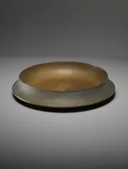 Footed bowl by Angelo Mangiarotti, circa 1962, Cast and polished bronze, sold Sep 2013