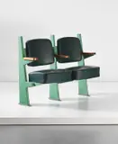 Jean Prouvé, Row of two lecture theatre chairs with adjustable seats, designed for the Faculté de Lettres, Université de Besançon, 1952-1956, Painted bent steel, painted tubular steel, oak, vinyl