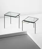 Mathieu Matégot, Two nesting tables, circa 1956, Etched glass, tubular brass, painted tubular metal