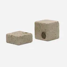 Untitled by Carol Bove, c. 2002, concrete, stones in two parts, sold May 2024