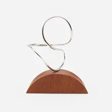 José de Rivera, Construction 6-52, 1952, stainless steel, mahogany
