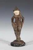 Georges Omerth, Boy Dressed as Clown with Dog, Bronze and ivory, on marble base; signed