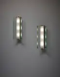 Max Ingrand, Pair of rare wall lights, model no. 2052, 1960s, Clear and frosted glass, brass