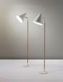 Pair of standard lamps, model no. 9627 by Paavo Tynell, 1950s, Painted perforated aluminium, cane-wrapped tubular metal, tubular brass, brass, sold Sep 2013