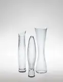 Tapio Wirkkala, Group of three vases, model nos. 3215, 3522, 3561, including 'Varsanjalka' (Foal's foot) and 'Tuonelan Virta' (Stream of Hades)
