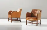 Pair of easy chairs by Kaare Klint and Edvard Kindt-Larsen, 1930s, Nigerien leather, Cuban mahogany, brass, sold Sep 2013