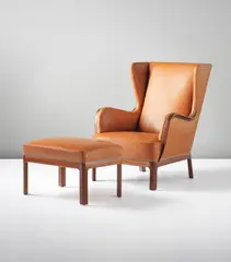 Frits Henningsen, Armchair and ottoman, 1930s, Mahogany, leather, brass