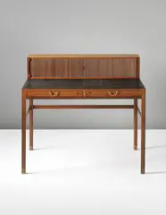 Writing desk by Ole Wanscher, circa 1945, Rosewood-veneered wood, rosewood, leather, brass, sold Sep 2013