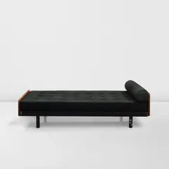 Jean Prouvé, 'S.C.A.L.' bed, model no. 450, circa 1950, painted steel, fabric upholstery, oak