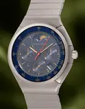 Iwc, A fine and well-preserved titanium quartz chronograph wristwatch with date, moonphase, tachymeter scale, blue dial and bracelet, 1991, Switzerland
