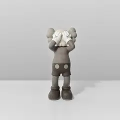 AT THIS TIME by Kaws, 2016, painted bronze, offered Nov 2024