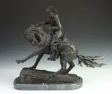 Frederic Remington, Cowboy, On a green marble base