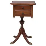 Mesa de Noche, SIGLO XX, Talla en madera. Consta de dos cajones, soporte trípode con terminación en garras de bronce y cubierta irregular