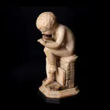 Isabelo Lacandola Tampinco, Untitled (Angel Writing in a Book), alabaster