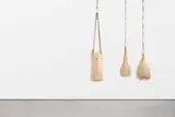 Birgit Dieker, Die drei Grazien, 2001, Mischtechnik (Mieder, Stoff, Leder, Ösen, Seil, Füllung: Mais, Stoffreste)