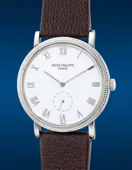 Patek Philippe, A fine and attractive white gold wristwatch with “Clous de Paris” bezel, white porcelain dial, Roman numerals, small seconds and Certificate of Origin, Circa 1999