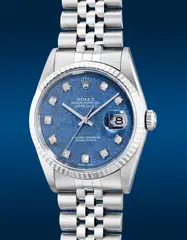 Rolex, A fine and attractive stainless steel wristwatch with center seconds, date, blue sodalite dial, diamond-set indexes, white gold bezel, bracelet and guarantee, Circa 2000