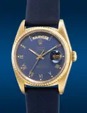 Rolex, A fine and attractive yellow gold wristwatch with center seconds, day, applied Roman numerals and deep blue dial, Circa 1983