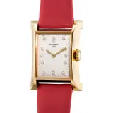 Patek Philippe, A lady’s elegant and rare limited edition yellow gold rectangular-shaped wristwatch with diamond-set indexes, made to commemorate the inauguration of Patek Philippe’s Geneva watchmaking center in 1997