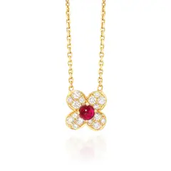 Van Cleef & Arpels, A Ruby and Diamond 'Trefle' Pendant Necklace, - Set with a round cabochon ruby, 0.40 carat - Decorated by brilliant-cut diamonds, 0.36 carat total - 18K gold - Signed VCA for Van Cleef & Arpels, numbered - With maker's mark for Van Cleef & Arpels and French assay mark for gold - Neckchain length 41.5 cm, shortest length 35.0 cm - Pendant length approximately 1.0 cm