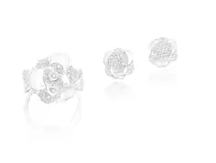 Chanel, A Set of White Gold and Diamond 'Camellia' Jewellery, Ring - Set with brilliant-cut diamonds - 18K white gold - Signed Chanel, numbered - With French assay mark for gold, and maker's mark - Ring size 6¼ Accompanied by a Chanel certificate Earrings - Set with brilliant-cut diamonds - 18K white gold - Signed Chanel, numbered - Length approximately 1.3 cm