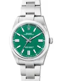 Rolex, A fine, well-preserved and sought-after stainless steel wristwatch with center seconds, green lacquered dial, guarantee and presentation box
