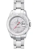 Rolex, A fine, "new-old-stock" and attractive stainless steel wristwatch with platinum bezel, center seconds, date, bracelet, guarantee and presentation box