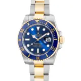 Rolex, A fine and well-preserved two tone yellow gold and stainless steel diver’s wristwatch with date, center seconds, bracelet, guarantee and box